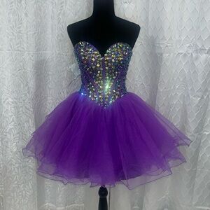 Fit to flair strapless purple Sherri hill dress
